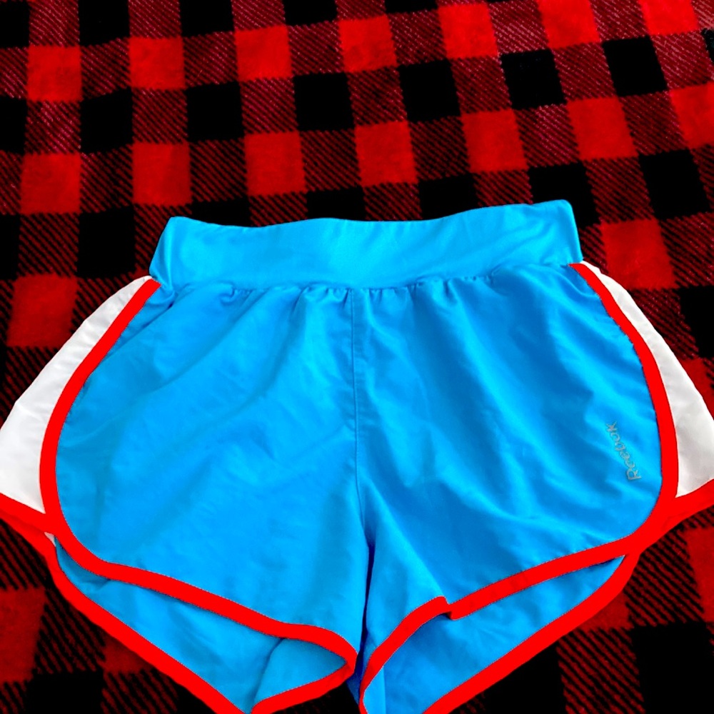Reebok running shorts.